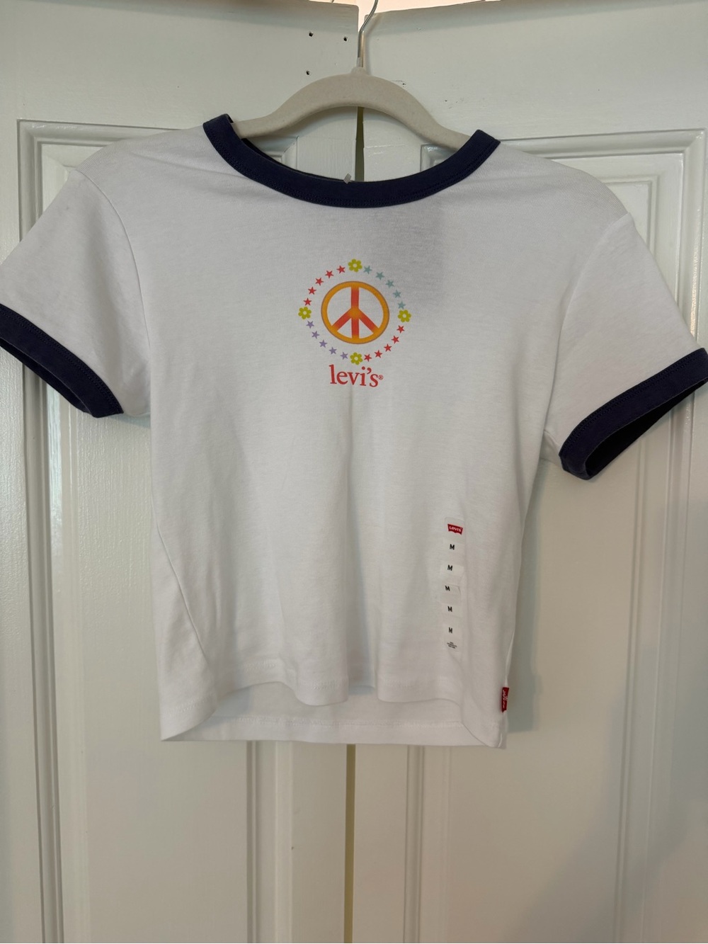 Levi's White Tee with Navy Trim and Rainbow Peace Logo